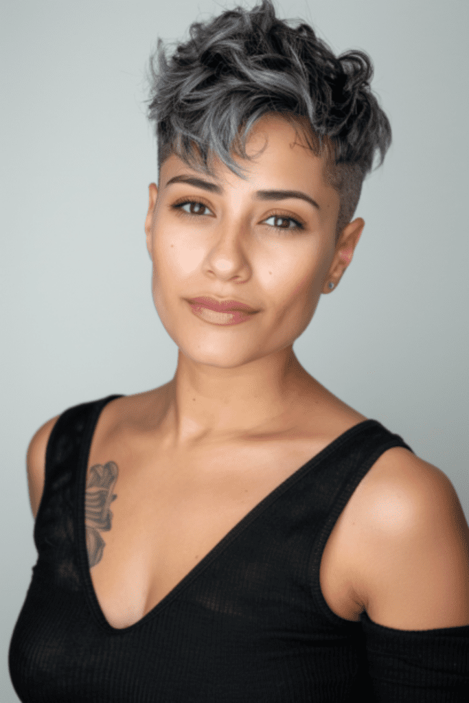 Short pixie haircuts with soft gray hair and an undercut for a modern twist.