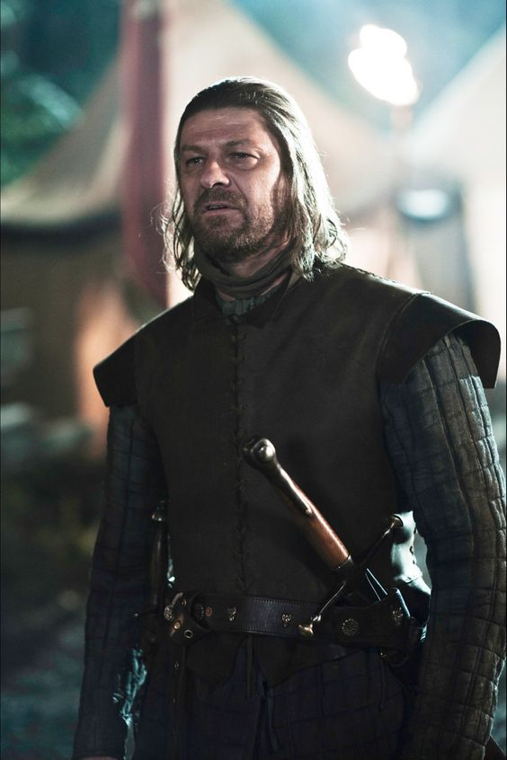 Ned Stark with a practical and straightforward haircut symbolizing Stark honor and simplicity.