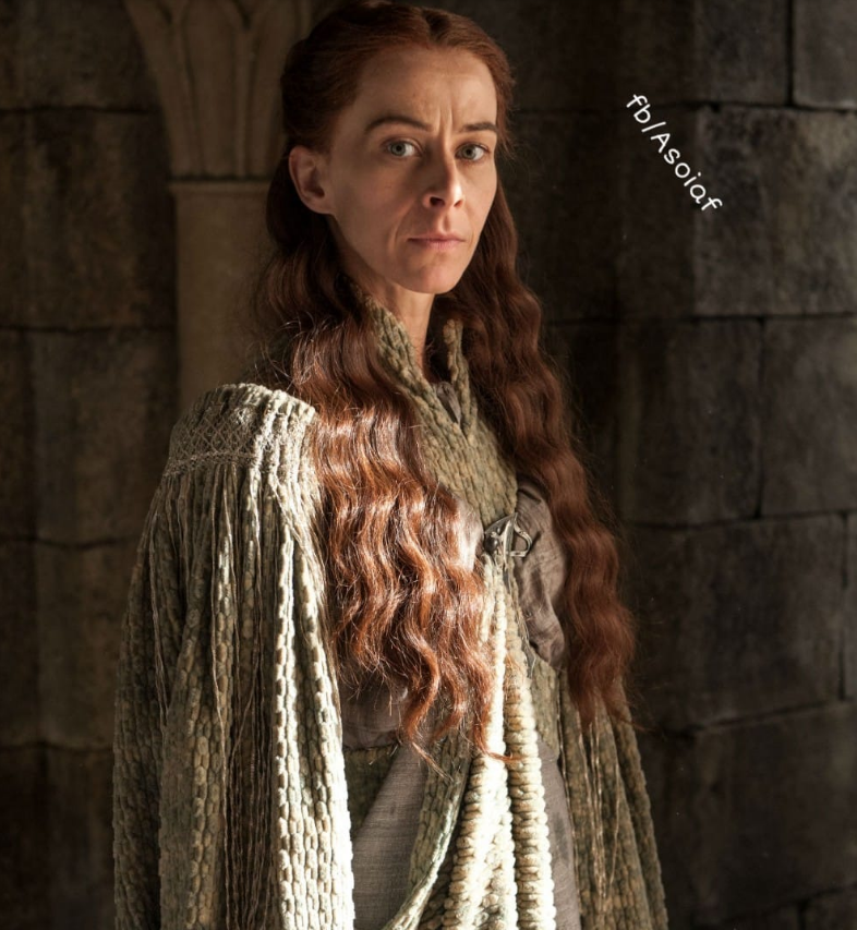 Lysa Arryn with windswept locks, symbolizing the harsh, isolated environment of the Eyrie.